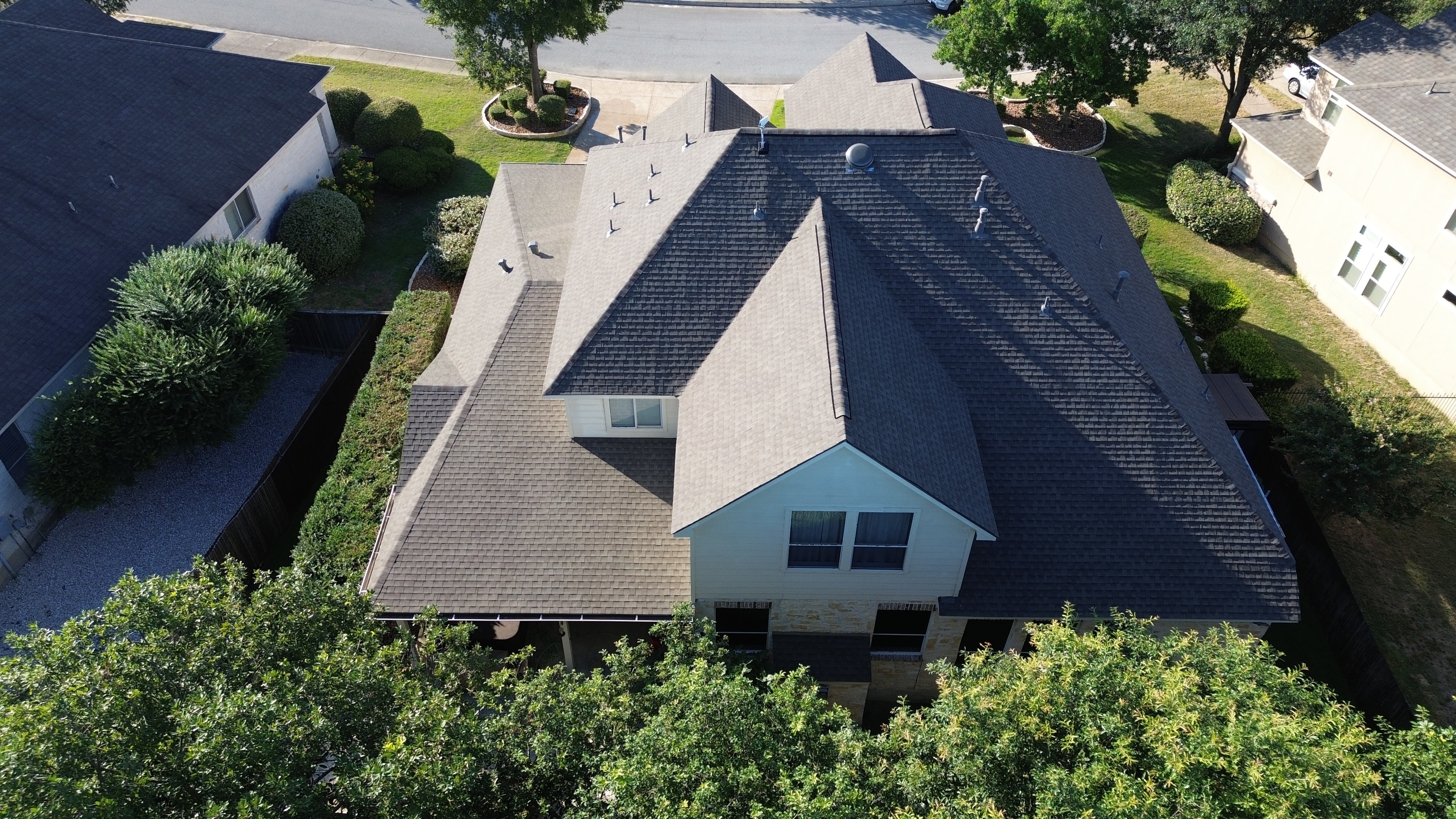 Aerial view residential house with peaked roof