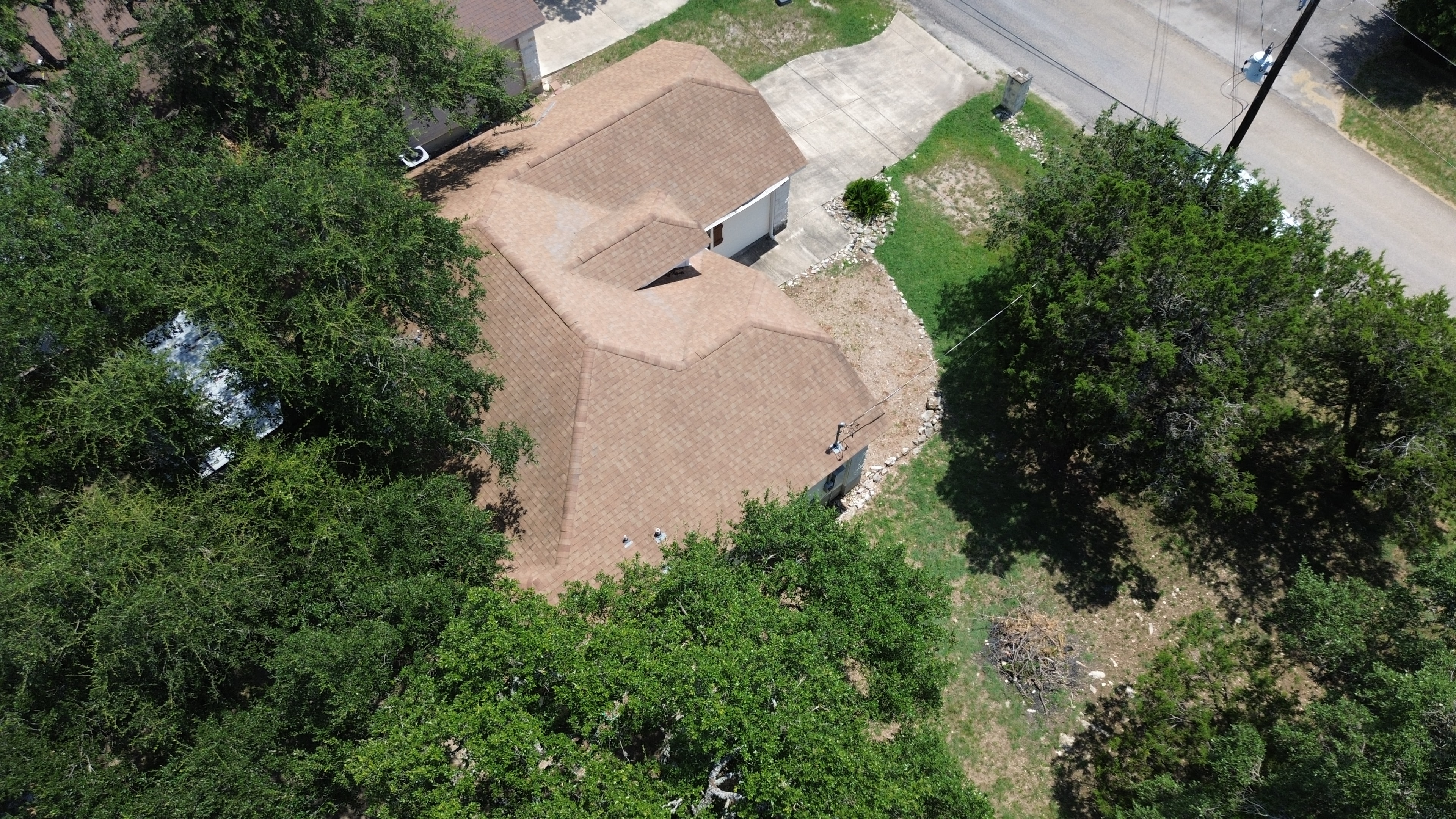 Aerial view residential backyard patio trees