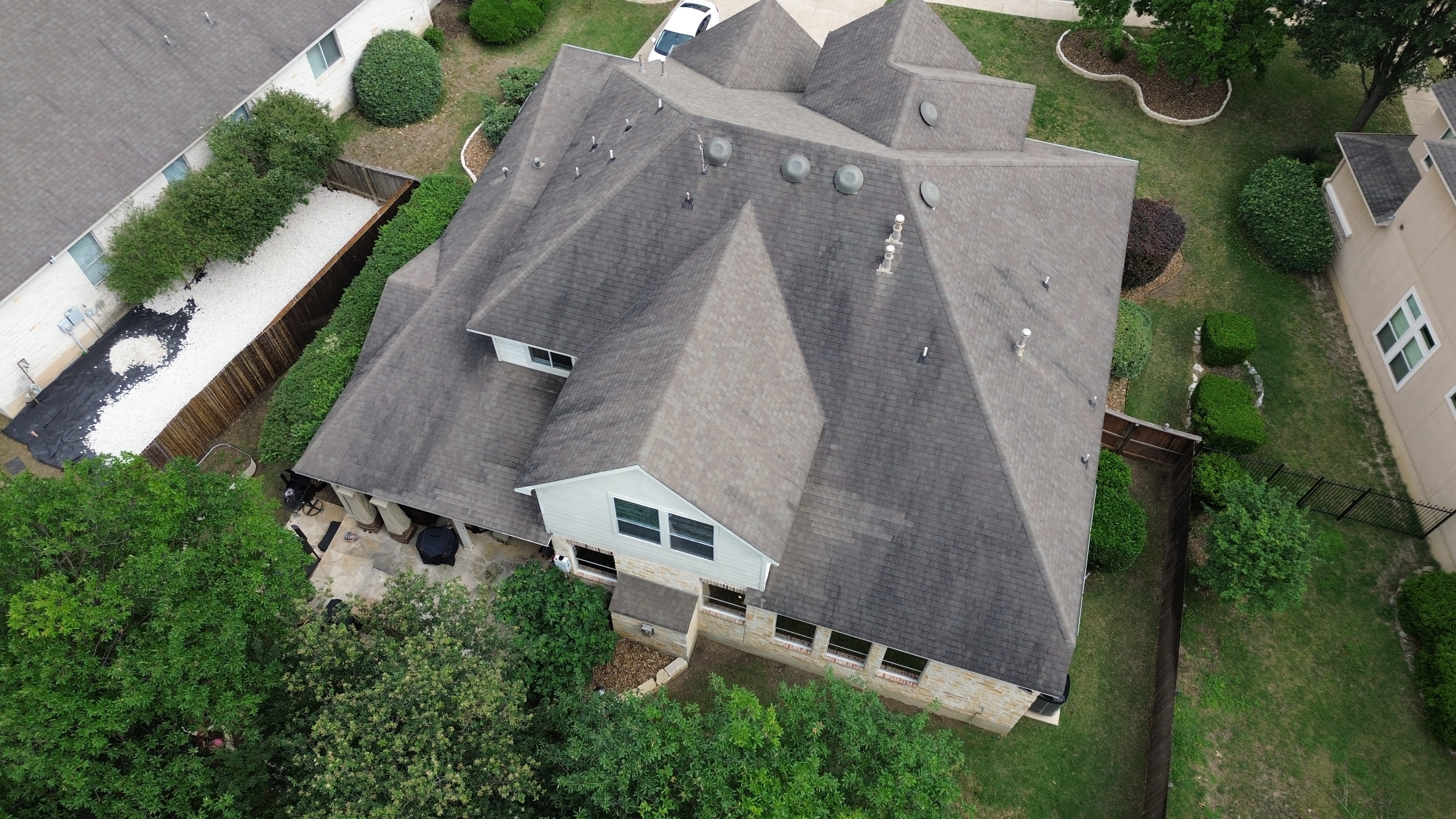 Aerial view suburban house gray roof